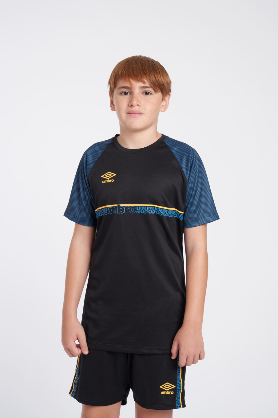 CAMISETA UMBRO SPIRITO JERSEY - JNRBLACK / ORANGE POP / AZUL PETROL