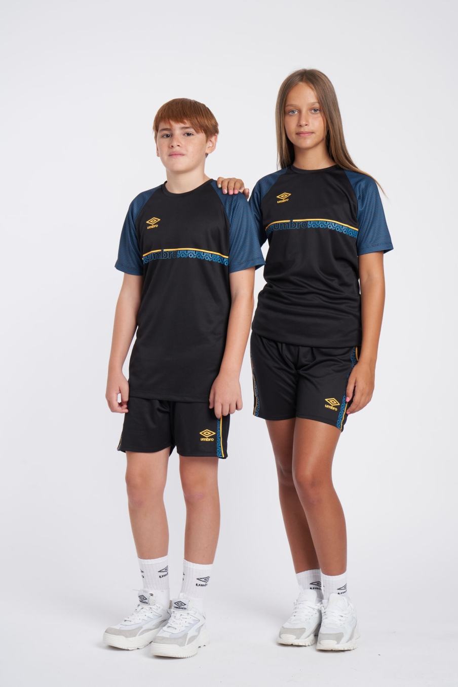 CAMISETA UMBRO SPIRITO JERSEY - JNRBLACK / ORANGE POP / AZUL PETROL