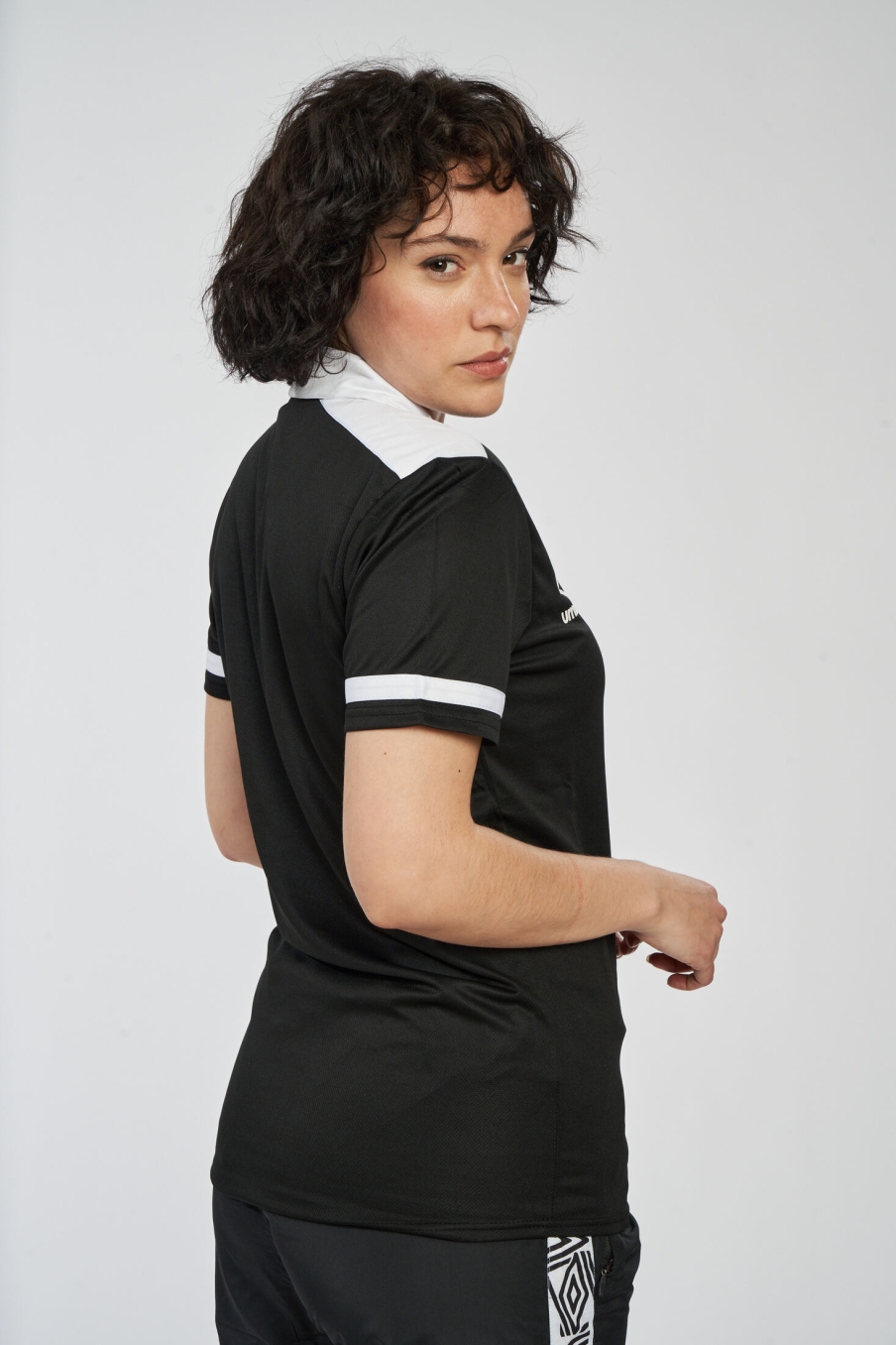 Polo Umbro Manyara preto / branco