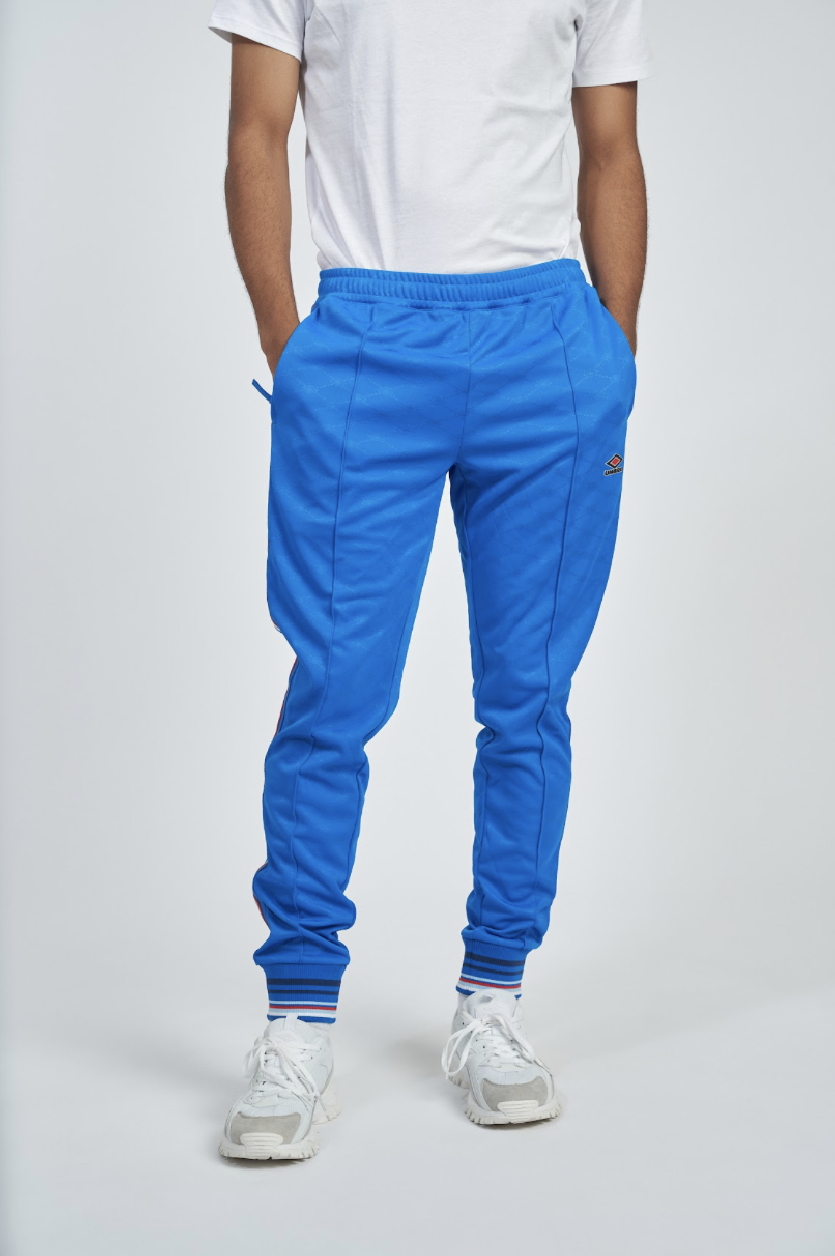 Pantalón Umbro Monogram Track Regal Blue
